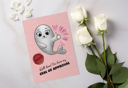 A kawaii greeting card from Rainbow & Bubbles, showing the proud Baby Seal with a big thumbs up, a wav seal of approval. The front says "Well done! You have my seal of approval".