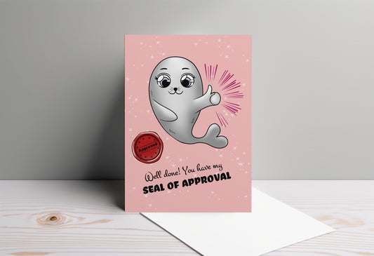 A kawaii greeting card from Rainbow & Bubbles, showing the proud Baby Seal with a big thumbs up, a wav seal of approval. The front says "Well done! You have my seal of approval".