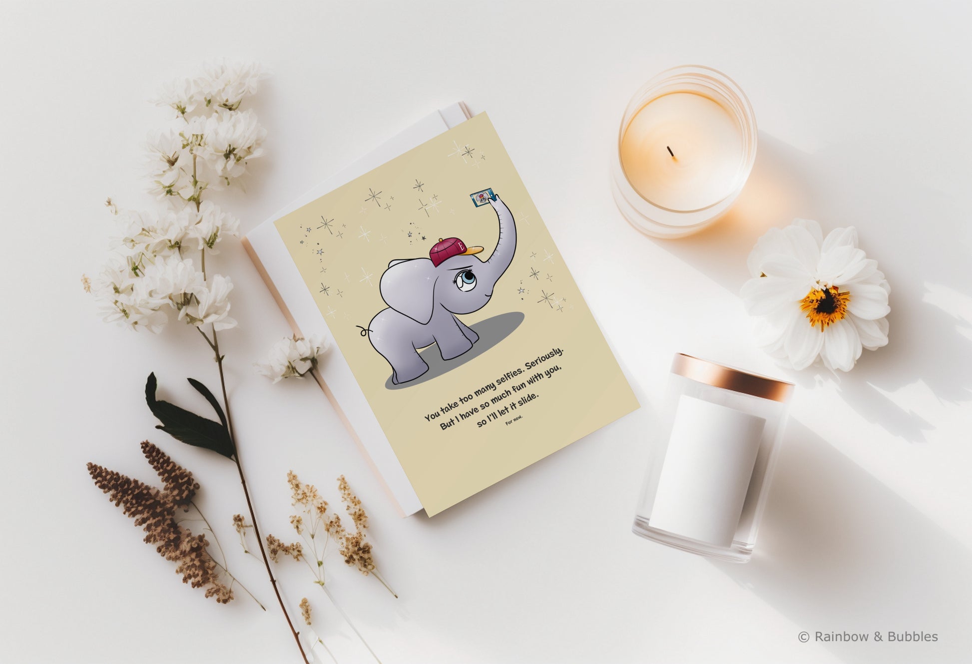 A kawaii greeting card from Rainbow & Bubbles, showing an elephant taking a selfie.