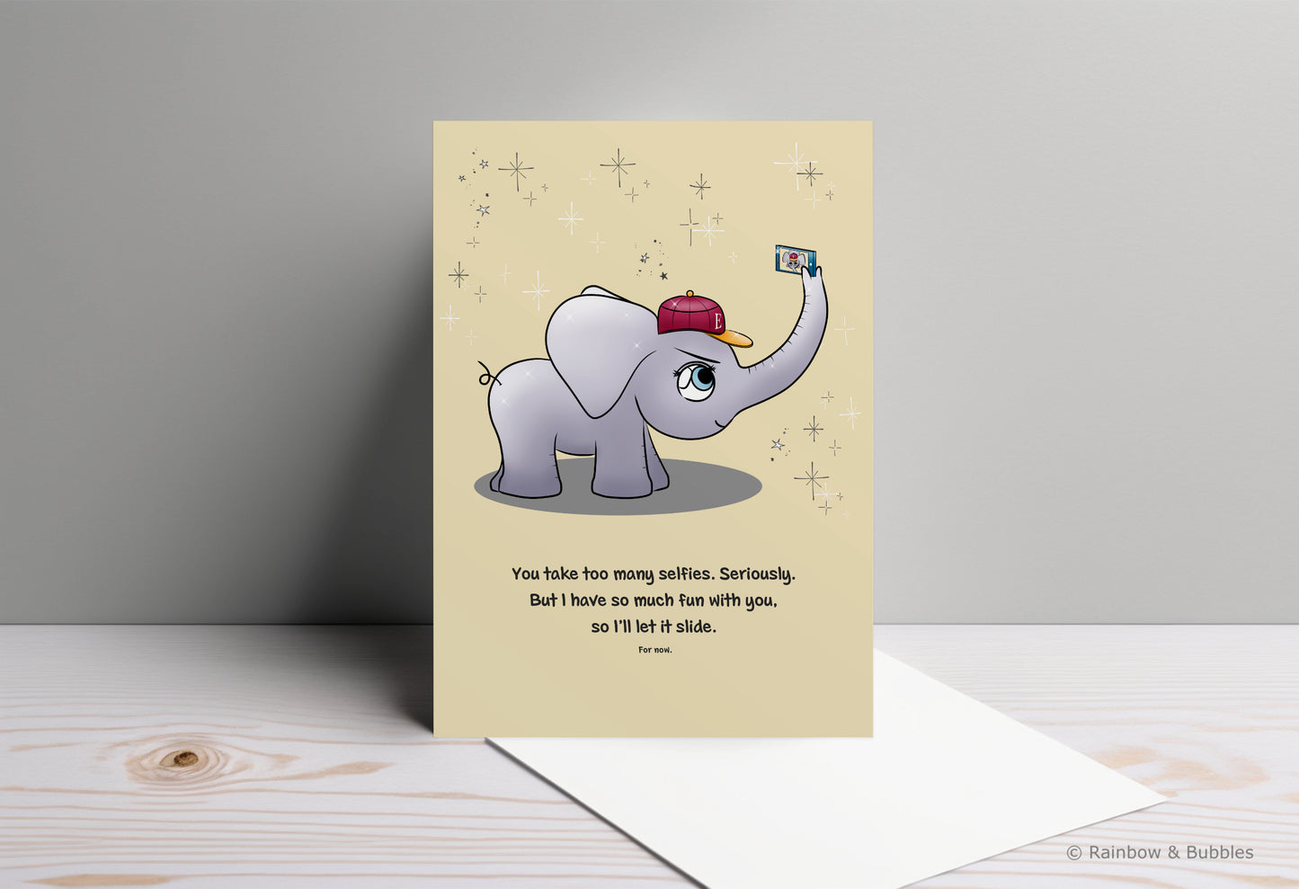 A kawaii greeting card from Rainbow & Bubbles, showing an elephant taking a selfie.